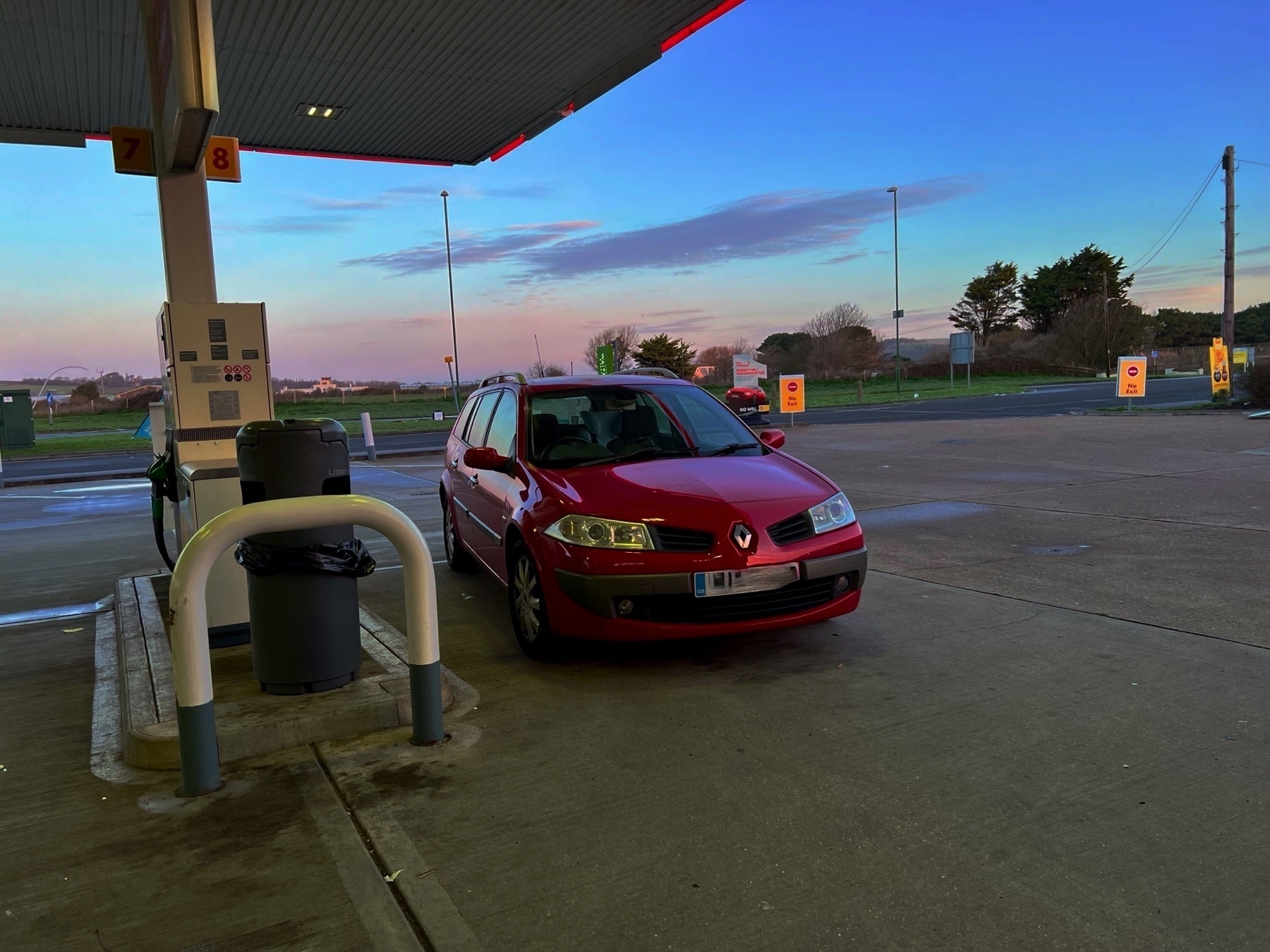 A Renault Megane at a petrol station. 