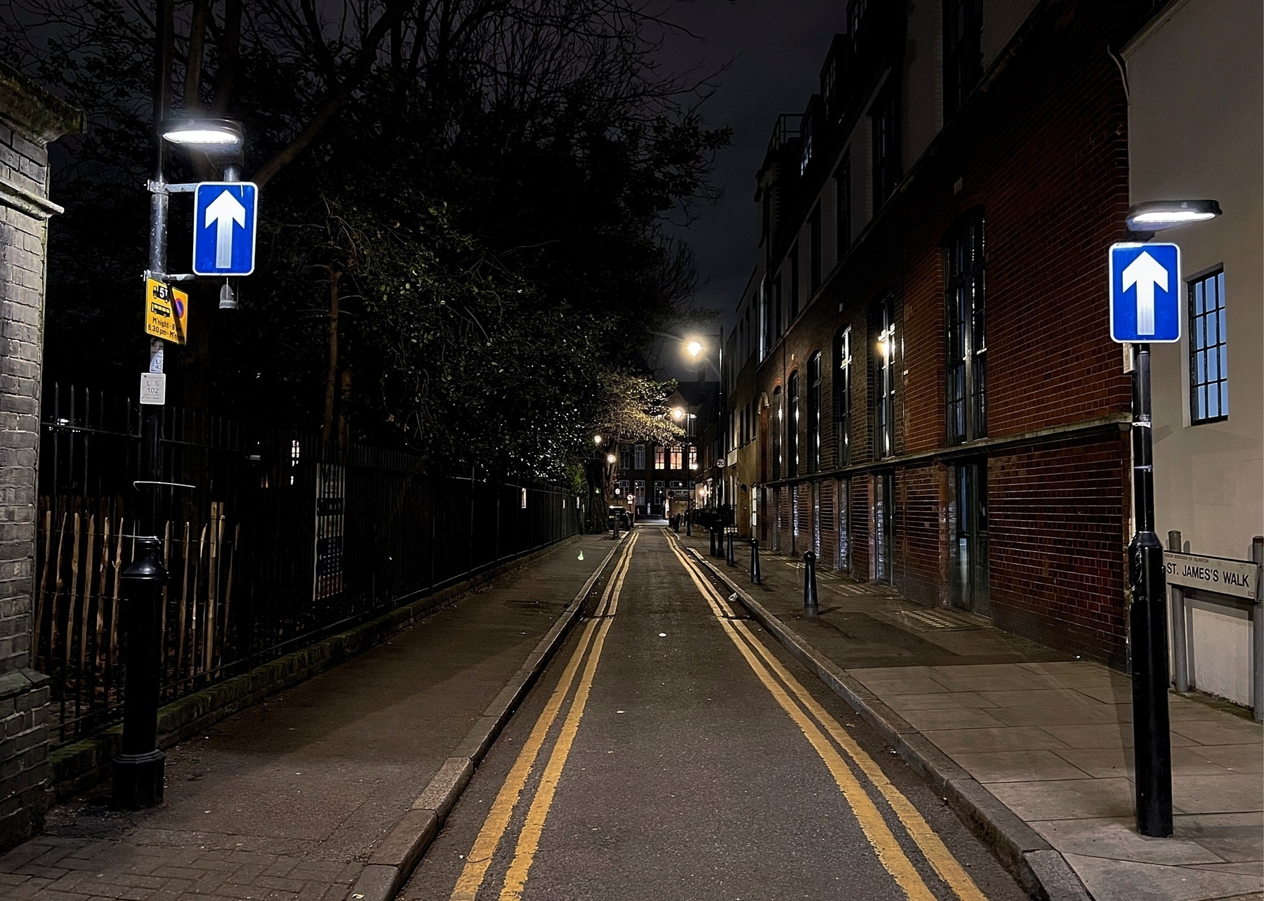 A deserted London street at night. 